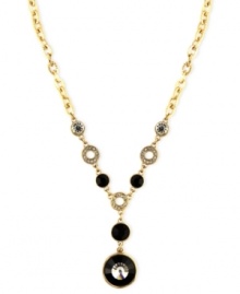 Add a sleek y-design to your neckline. Jones New York's elegant necklace combines clear and black plastic and glass beads on a gold tone mixed metal chain. Approximate length: 16 inches + 3-inch extender. Approximate drop: 2-1/2 inches. Add a sleek y-design to your neckline. Jones New York's elegant necklace combines clear and black plastic and glass beads on a gold tone mixed metal chain. Approximate length: 16 inches + 3-inch extender. Approximate drop: 2-1/2 inches.
