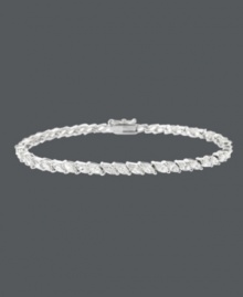 Exemplify elegance. This stunning tennis bracelet by B. Brilliant highlights sparkling, marquise-cut cubic zirconias (7-1/5 ct. t.w.) set in sterling silver. Approximate length: 7-1/4 inches. Exemplify elegance. This stunning tennis bracelet by B. Brilliant highlights sparkling, marquise-cut cubic zirconias (7-1/5 ct. t.w.) set in sterling silver. Approximate length: 7-1/4 inches.