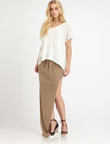 A large patch pocket adorns the front of this delicate eyelet tee for a playful design. Wide boatneckDropped shouldersShort dolman sleevesChest patch pocketAllover semi-sheer eyelet knitU-shaped hem74% polyester/26% rayonHand washMade in USAModel shown is 5'9 (176cm) wearing US size Small. A large patch pocket adorns the front of this delicate eyelet tee for a playful design. Wide boatneckDropped shouldersShort dolman sleevesChest patch pocketAllover semi-sheer eyelet knitU-shaped hem74% polyester/26% rayonHand washMade in USAModel shown is 5'9 (176cm) wearing US size Small.