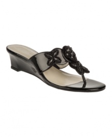 The Kyros wedge sandals by Etienne Aigner embellish your look with their rhinestone-detailed straps and versatile wedge heel. The Kyros wedge sandals by Etienne Aigner embellish your look with their rhinestone-detailed straps and versatile wedge heel.