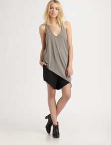 Your favorite jersey tank, updated in an oversized, asymmetrical silhouette.ScoopneckAsymmetrical hemRacerbackAbout 37 from shoulder to hem50% modal/50% cottonMachine washImportedModel shown is 5'10 (177cm) wearing US size Small. Your favorite jersey tank, updated in an oversized, asymmetrical silhouette.ScoopneckAsymmetrical hemRacerbackAbout 37 from shoulder to hem50% modal/50% cottonMachine washImportedModel shown is 5'10 (177cm) wearing US size Small.