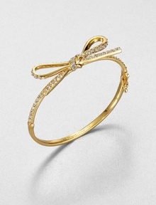 From the Skinny Mini Collection. A dainty bow, outlined in sparkling crystals, is like gift wrapping for your wrist.CrystalGoldtoneDiameter, about 2.25Hinged with push-lock safety claspImported From the Skinny Mini Collection. A dainty bow, outlined in sparkling crystals, is like gift wrapping for your wrist.CrystalGoldtoneDiameter, about 2.25Hinged with push-lock safety claspImported