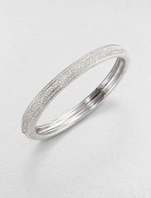 EXCLUSIVELY AT SAKS.COM. A brilliant piece with three sparkling rows of crystals. CrystalsRhodium-plated brassDiameter, about 2.25Hinged, tongue-and-box closureImported EXCLUSIVELY AT SAKS.COM. A brilliant piece with three sparkling rows of crystals. CrystalsRhodium-plated brassDiameter, about 2.25Hinged, tongue-and-box closureImported