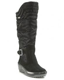 Pajar's cozy quilted boots offer both warmth and style with shearling lining and smart buckle details. Pajar's cozy quilted boots offer both warmth and style with shearling lining and smart buckle details.