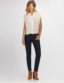 Breezy silk v-neck with on-trend fringe, cap sleeves and a button front. Fringe v-neckCap sleevesButton frontSilkDry cleanImportedModel shown is 5'10½ (179cm) wearing US size 4. Breezy silk v-neck with on-trend fringe, cap sleeves and a button front. Fringe v-neckCap sleevesButton frontSilkDry cleanImportedModel shown is 5'10½ (179cm) wearing US size 4.