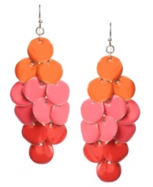 Feel the retro vibe in Haskell's dynamic drop earrings. A diamond-shaped pattern of discs in bright fuchsia and orange hues adorn a silver tone mixed metal ear wire. Approximate drop: 3 inches. Feel the retro vibe in Haskell's dynamic drop earrings. A diamond-shaped pattern of discs in bright fuchsia and orange hues adorn a silver tone mixed metal ear wire. Approximate drop: 3 inches.