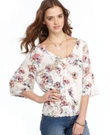 American Rag adds flair to a blouson top with three-quarter bell sleeves and a wide v-neck that gorgeously flaunts your décolletage! American Rag adds flair to a blouson top with three-quarter bell sleeves and a wide v-neck that gorgeously flaunts your décolletage!