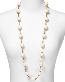 RJ Graziano channels '40s-inspired chic with this beaded necklace. Egg-shaped ivory beads capped with gold tone hardware blend elegantly with a range of looks. RJ Graziano channels '40s-inspired chic with this beaded necklace. Egg-shaped ivory beads capped with gold tone hardware blend elegantly with a range of looks.