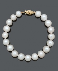 Add a hint of elegance with a fine strand of pearls. Bracelet features cultured freshwater pearls (9-10 mm) with a 14k gold clasp. Approximate length: 7-1/2 inches. Add a hint of elegance with a fine strand of pearls. Bracelet features cultured freshwater pearls (9-10 mm) with a 14k gold clasp. Approximate length: 7-1/2 inches.