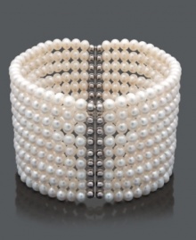 Layer your wrist in nine, elegant rows of pearl. This bracelet features cultured freshwater pearls (4-5 mm) in a chic cuff design. Crafted in sterling silver. Bracelet stretches to fit wrist. Approximate length: 7 inches. Layer your wrist in nine, elegant rows of pearl. This bracelet features cultured freshwater pearls (4-5 mm) in a chic cuff design. Crafted in sterling silver. Bracelet stretches to fit wrist. Approximate length: 7 inches.