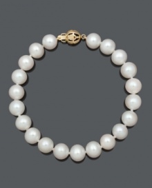 Embrace the subtlety of traditional style. This classic bracelet features AA+ cultured freshwater pearls (8-9 mm) with a 14k gold clasp. Approximate length: 7-1/2 inches. Embrace the subtlety of traditional style. This classic bracelet features AA+ cultured freshwater pearls (8-9 mm) with a 14k gold clasp. Approximate length: 7-1/2 inches.