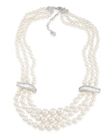 Let elegance define your look. Carolee's stunning three-row necklace features glass pearls accented by sparkling glass spacers. Set in silver tone mixed metal. Approximate length 18 inches + 2-inch extender. Let elegance define your look. Carolee's stunning three-row necklace features glass pearls accented by sparkling glass spacers. Set in silver tone mixed metal. Approximate length 18 inches + 2-inch extender.