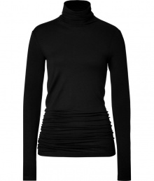 Inject a luxe edge into your casual look with Donna Karans black jersey turtleneck, detailed with a contemporary gathered back for chic, modern results - Turtleneck, long sleeves, contoured gathered back seam, asymmetrical hemline - Form-fitting, gathered silhouette - For a futuristic look, wear with jet black separates and metallic detailed accessories Inject a luxe edge into your casual look with Donna Karans black jersey turtleneck, detailed with a contemporary gathered back for chic, modern results - Turtleneck, long sleeves, contoured gathered back seam, asymmetrical hemline - Form-fitting, gathered silhouette - For a futuristic look, wear with jet black separates and metallic detailed accessories
