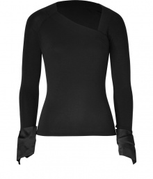 Both contemporary and incredibly chic, Donna Karans satin cuffed top lends an understated edge of dark glamour to your look - Wrapped elasticized asymmetrical neckline, wrapped satin cuffs - Form-fitting - Team with jet black knits and luxe streamlined accessories Both contemporary and incredibly chic, Donna Karans satin cuffed top lends an understated edge of dark glamour to your look - Wrapped elasticized asymmetrical neckline, wrapped satin cuffs - Form-fitting - Team with jet black knits and luxe streamlined accessories