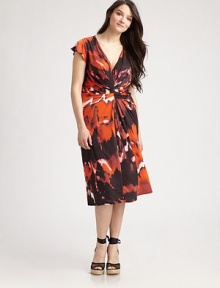 Fiery hues and flattering ruching add instant appeal to this classic stretch satin design.V-necklineCap sleevesGathered details on front and backBack seamAbout 30 from natural waist95% polyester/5% elastaneDry cleanImported Fiery hues and flattering ruching add instant appeal to this classic stretch satin design.V-necklineCap sleevesGathered details on front and backBack seamAbout 30 from natural waist95% polyester/5% elastaneDry cleanImported
