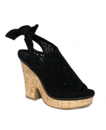 Tie on a sweet finish to your look. The Teak sandals by American Rag combine a floral-perforated upper with a cork heel for earthy appeal. Tie on a sweet finish to your look. The Teak sandals by American Rag combine a floral-perforated upper with a cork heel for earthy appeal.