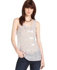 Add sparkle to any day in this DKNY Jeans tank top, featuring tonal sequins on sheer, printed fabric. Pair it with dark jeans for a seamless day-to-night look. Add sparkle to any day in this DKNY Jeans tank top, featuring tonal sequins on sheer, printed fabric. Pair it with dark jeans for a seamless day-to-night look.
