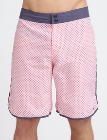 A dashing diamond print pattern in a vibrant summer hue lends modern style to a casual swim favorite.Snap button frontBack flap pocketInseam, about 9NylonMachine washImported A dashing diamond print pattern in a vibrant summer hue lends modern style to a casual swim favorite.Snap button frontBack flap pocketInseam, about 9NylonMachine washImported