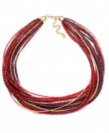 Berry beautiful! Rich red and purple hues set apart this chic collar necklace from c.A.K.e. by Ali Khan, making it a stylish fashion statement for fall. Adorned with an intricate array of seed beads and faceted glass rondelle accents, it's crafted in gold tone mixed metal. Approximate length: 16 inches + 3-inch extender. Berry beautiful! Rich red and purple hues set apart this chic collar necklace from c.A.K.e. by Ali Khan, making it a stylish fashion statement for fall. Adorned with an intricate array of seed beads and faceted glass rondelle accents, it's crafted in gold tone mixed metal. Approximate length: 16 inches + 3-inch extender.