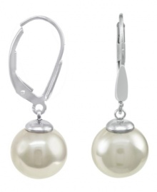From the island of Mallorca, Spain, these drop earrings feature white round organic man-made pearl (10 mm) set in sterling silver. Approximate drop: 1 inch. From the island of Mallorca, Spain, these drop earrings feature white round organic man-made pearl (10 mm) set in sterling silver. Approximate drop: 1 inch.