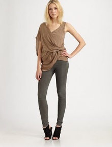 This lustrous topper drapes around the body in a crossover V-neck shift.V necklineSingle draped sleevesCrossover bodiceCinched waistAsymmetrical hemAbout 33 from shoulder to hemPolyesterDry cleanMade in USA of imported fabricModel shown is 5'9½ (177cm) wearing US size Small.OUR FIT MODEL RECOMMENDS ordering true size. This lustrous topper drapes around the body in a crossover V-neck shift.V necklineSingle draped sleevesCrossover bodiceCinched waistAsymmetrical hemAbout 33 from shoulder to hemPolyesterDry cleanMade in USA of imported fabricModel shown is 5'9½ (177cm) wearing US size Small.OUR FIT MODEL RECOMMENDS ordering true size.