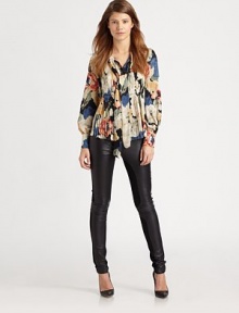 Silk blouse with bishop sleeves, enlivened by a vivacious floral print, neck tie and front pleating. Neck self-tieButton frontLong bishop sleeves with buttoned cuffsSilkDry cleanImportedModel shown is 5'10 (177cm) wearing US size Small.