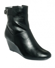 Incorporating a sophisticated wrap-around silhouette with an almond-shaped toe, the Nadina wedge booties by Alfani are an ultimate cold-weather must-have. Incorporating a sophisticated wrap-around silhouette with an almond-shaped toe, the Nadina wedge booties by Alfani are an ultimate cold-weather must-have.