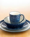 Capture the luminous quality of gentle waves with this bold dinnerware collection. A deep blue, texturally rich pattern complemented by soft white brings depth to any table. The perfect accent for a seaside home or for creating a tranquil mood. The Elements Marine place settings include a dinner plate, salad plate, soup/cereal bowl and mug.