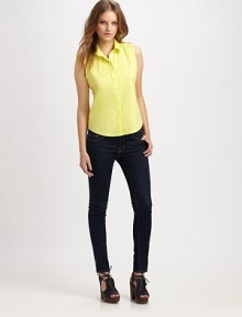 The essential button-down crafted from light stretch cotton in a refreshing sleeveless silhouette. Point collarButton-down placketShirttail hemBack princess seamsAbout 22 from shoulder to hem72% cotton/23% nylon/5% Lycra®Dry cleanImported of Italian fabricModel shown is 5'8½ (174cm) wearing US size Small. The essential button-down crafted from light stretch cotton in a refreshing sleeveless silhouette. Point collarButton-down placketShirttail hemBack princess seamsAbout 22 from shoulder to hem72% cotton/23% nylon/5% Lycra®Dry cleanImported of Italian fabricModel shown is 5'8½ (174cm) wearing US size Small.