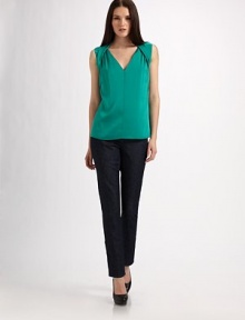 All about shape, in stretch silk georgette with soft pleating and halter-look detailing at the shoulders.Deep V necklineCap sleeves with soft shoulder pleatsHalter-look angled bands ease into back foldover collarSide zip closureAbout 24 from shoulder to hem95% silk/5% elastaneDry cleanImported Model shown is 5'9½ (176cm) wearing US size Small. All about shape, in stretch silk georgette with soft pleating and halter-look detailing at the shoulders.Deep V necklineCap sleeves with soft shoulder pleatsHalter-look angled bands ease into back foldover collarSide zip closureAbout 24 from shoulder to hem95% silk/5% elastaneDry cleanImported Model shown is 5'9½ (176cm) wearing US size Small.