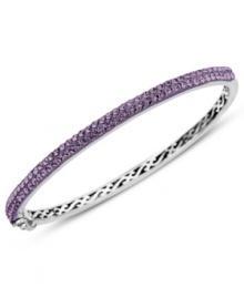 Slim, stackable style. Kaleidoscope's thin shimmering bangle makes a statement all its own, but can also be stacked with similar styles for a trendy layered look. Features round-cut purple crystals with with Swarovski Elements. Set in sterling silver. Bracelet features a hinge clasp. Approximate diameter: 2-1/2 inches.