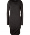 Sumptuously soft and effortlessly elegant, Donna Karans pure, charcoal cashmere knit dress epitomizes understated luxury - Slim cut, with pencil-style skirt, flattering boatneck and long, fitted sleeves - Gorgeous drape detail at hem - Slips on - A versatile compliment to any wardrobe perfect for pairing with ankle booties or platform pumps