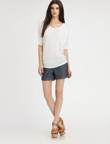 Comfy, everyday boatneck has dropped shoulders and trendy three-quarter dolman sleeves. BoatneckDropped shouldersThree-quarter dolman sleevesRayonDry cleanImportedModel shown is 5'10 (177cm) wearing US size Small. Comfy, everyday boatneck has dropped shoulders and trendy three-quarter dolman sleeves. BoatneckDropped shouldersThree-quarter dolman sleevesRayonDry cleanImportedModel shown is 5'10 (177cm) wearing US size Small.