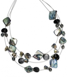 Shell connection. Style&co. is inspired by the sea in this layered necklace. Crafted from hematite tone mixed metal, the necklace's shells blend in with black accents. Approximate length: 18 inches.