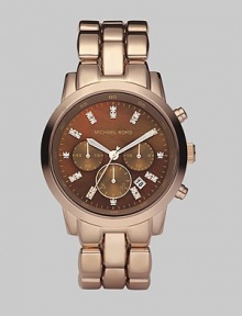 A rose goldtone finish gives a warm glow to a stainless steel chronograph with a lustrous chocolate dial.Quartz movement Water-resistant to 10ATM Polished bezel Round stainless steel case with rose goldtone finish, 42mm (1.69) Chocolate mother-of-pearl dial with crystal hour markers Three chronograph sub dials Date display at 4 o'clock Second hand Rose goldtone-finished stainless steel link bracelet Imported A rose goldtone finish gives a warm glow to a stainless steel chronograph with a lustrous chocolate dial.Quartz movement Water-resistant to 10ATM Polished bezel Round stainless steel case with rose goldtone finish, 42mm (1.69) Chocolate mother-of-pearl dial with crystal hour markers Three chronograph sub dials Date display at 4 o'clock Second hand Rose goldtone-finished stainless steel link bracelet Imported
