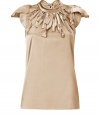 Raise the bar on contemporary classics with Steffen Schrauts elegant beige silk stretch top -  Butterfly cap sleeves and decorative fringe trim at neckline - Small stand up collar ties at back with an oversize bow - Fitted, feminine silhouette tapers gently through waist - Pair a blazer or denim jacket and style with with pencil skirts, skinny denim or dress trousers