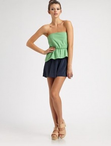 Colorblocked silk charmeuse in a strapless one-piece, easy-fit with a flirty ruffle at the waist.Top-fit bodiceElastic waistGathered shortsMesh back panelCenter back zipperRise, about 10Inseam, about 495% silk/5% spandexDry cleanMade in USAModel shown is 5'10 (177cm) wearing US size 4. Colorblocked silk charmeuse in a strapless one-piece, easy-fit with a flirty ruffle at the waist.Top-fit bodiceElastic waistGathered shortsMesh back panelCenter back zipperRise, about 10Inseam, about 495% silk/5% spandexDry cleanMade in USAModel shown is 5'10 (177cm) wearing US size 4.