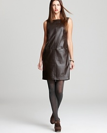 A sleek leather silhouette infuses the classic Jones New York Collection shift dress with urban sophistication. Layer over sheer tights for effortless edge. A sleek leather silhouette infuses the classic Jones New York Collection shift dress with urban sophistication. Layer over sheer tights for effortless edge.