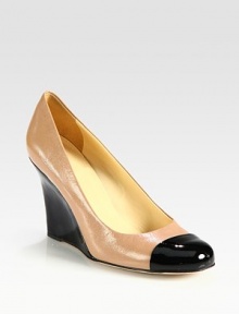 Lustrous leather pump has a contrasting patent leather wedge and toecap for a trendy colorblock effect. Self-covered wedge, 3½ (90mm)Leather and patent leather upperLeather lining and solePadded insoleMade in ItalyOUR FIT MODEL RECOMMENDS ordering true size. Lustrous leather pump has a contrasting patent leather wedge and toecap for a trendy colorblock effect. Self-covered wedge, 3½ (90mm)Leather and patent leather upperLeather lining and solePadded insoleMade in ItalyOUR FIT MODEL RECOMMENDS ordering true size.