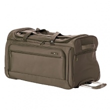 This superlight luggage combines the best elements of the classic duffel and the upright trolley - grab-and-go handles and smoothly rolling wheels. It's constructed of Ny-tec material backed with a vapor barrier and a fully integrated lightweight memory frame for structure and strength. The locking trolley handle operates with the single touch of a button. This superlight luggage combines the best elements of the classic duffel and the upright trolley - grab-and-go handles and smoothly rolling wheels. It's constructed of Ny-tec material backed with a vapor barrier and a fully integrated lightweight memory frame for structure and strength. The locking trolley handle operates with the single touch of a button.
