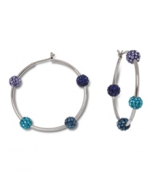 True blue. Brilliant gradated hues on sparkling crystal spheres define Swarovski's Pointiage® hoop earrings, which stand out stylishly in terms of both shape and color. Set in silver tone mixed metal. Approximate diameter: 1-5/8 inches. True blue. Brilliant gradated hues on sparkling crystal spheres define Swarovski's Pointiage® hoop earrings, which stand out stylishly in terms of both shape and color. Set in silver tone mixed metal. Approximate diameter: 1-5/8 inches.