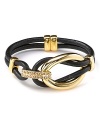 T Tahari makes a mixed material statement with this gold-plate and leather bracelet, boasting a bold contrast of tone and texture.