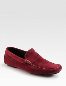 Soft suede penny loafer with intricate contrast stitching and a convenient rubber sole. Suede upperLeather liningPadded insoleSuede and rubber soleMade in Italy Soft suede penny loafer with intricate contrast stitching and a convenient rubber sole. Suede upperLeather liningPadded insoleSuede and rubber soleMade in Italy