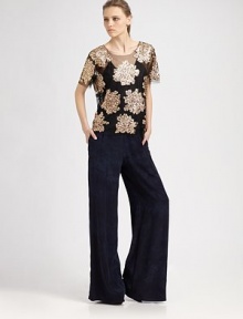 Sequined florals highlight sheer chiffon in this dazzling layered topper.JewelneckShort sleevesStraight hemCamisole includedAbout 23 from shoulder to hemNylonDry cleanImportedModel shown is 5'10 (177cm) wearing US size Small. Sequined florals highlight sheer chiffon in this dazzling layered topper.JewelneckShort sleevesStraight hemCamisole includedAbout 23 from shoulder to hemNylonDry cleanImportedModel shown is 5'10 (177cm) wearing US size Small.