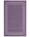 In playful purple, this charming rug will warm up any space in your home. A distinctive center grid gives the rug a delightful texture while coordinating well with casual and modern interiors. Hand-tufted of wool for premium softness and durability.