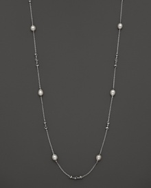 This sterling silver necklace, gleaming with freshwater pearls, makes an elegant statement. By Di MODOLO. This sterling silver necklace, gleaming with freshwater pearls, makes an elegant statement. By Di MODOLO.
