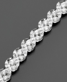 A brilliant diamond bracelet for your wrist. This extraordinary bracelet features diamonds (3 ct. t.w.) cast in 14k white gold in a beautiful rope pattern. Measures 7 1/2 long. A brilliant diamond bracelet for your wrist. This extraordinary bracelet features diamonds (3 ct. t.w.) cast in 14k white gold in a beautiful rope pattern. Measures 7 1/2 long.