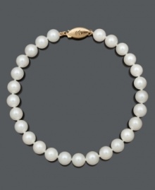 Channel classic style and beauty with a simple strand of pearls. Bracelet features AA Akoya cultured pearls (6-1/2-7 mm) with a 14k gold clasp. Approximate length: 8 inches. Channel classic style and beauty with a simple strand of pearls. Bracelet features AA Akoya cultured pearls (6-1/2-7 mm) with a 14k gold clasp. Approximate length: 8 inches.