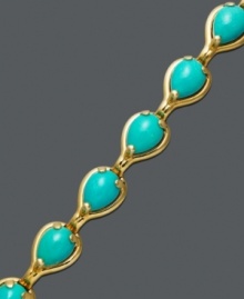 Snap up the hot new hue for summer! This bold bracelet features pear-cut turquoise stones (6-5/8 ct. t.w.) cradled in a rich 14k gold setting. Approximate length: 7 inches. Snap up the hot new hue for summer! This bold bracelet features pear-cut turquoise stones (6-5/8 ct. t.w.) cradled in a rich 14k gold setting. Approximate length: 7 inches.