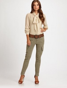 The epitome of timeless elegance, a hand-crinkled silk design with an air of whimsy, courtesy of fine tailoring and alluring details. Scarf-tieLong sleevesButton cuffsMother-of-pearl buttonsPatch pocketsCurved hemBack yokeAbout 28 from shoulder to hemSilkDry cleanImported Model shown is 5'9½ (176cm) wearing US size 4. The epitome of timeless elegance, a hand-crinkled silk design with an air of whimsy, courtesy of fine tailoring and alluring details. Scarf-tieLong sleevesButton cuffsMother-of-pearl buttonsPatch pocketsCurved hemBack yokeAbout 28 from shoulder to hemSilkDry cleanImported Model shown is 5'9½ (176cm) wearing US size 4.